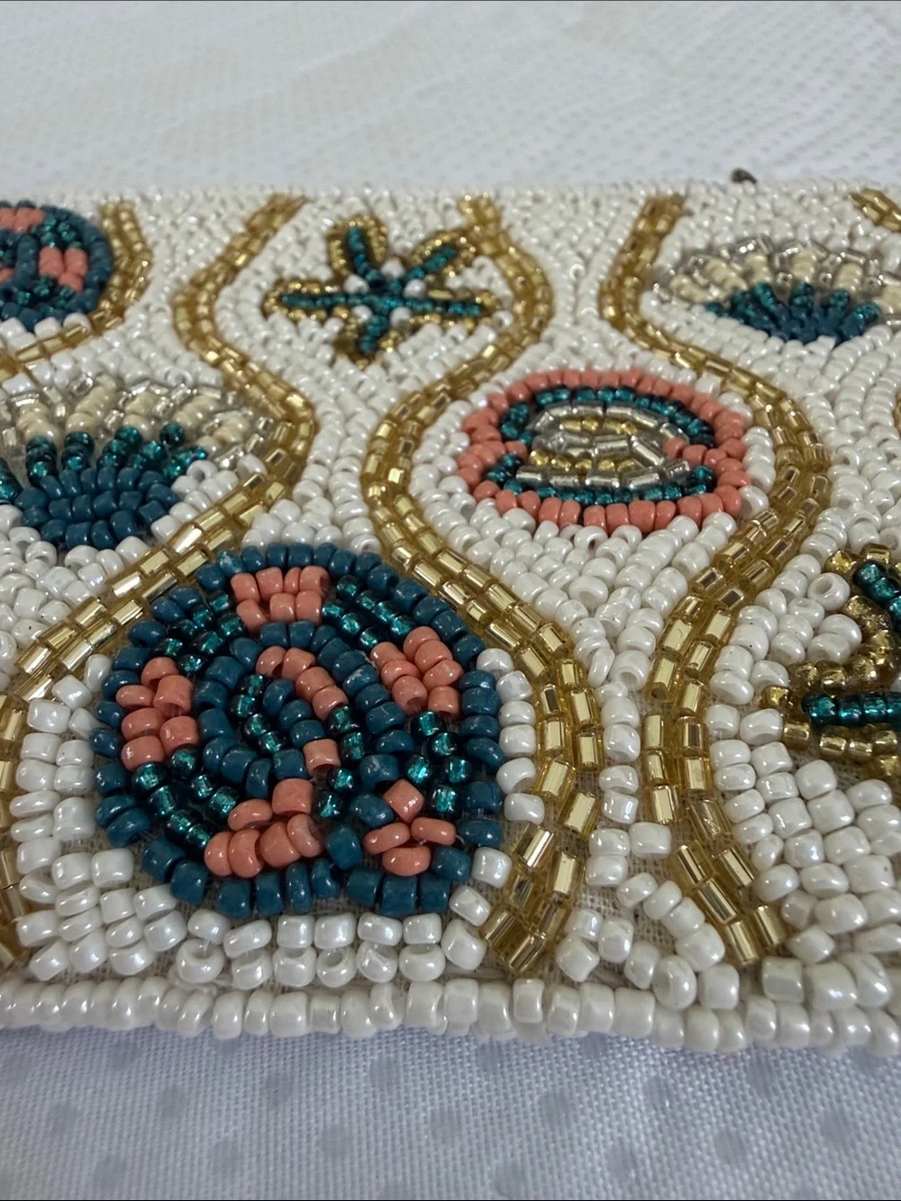 Beaded White Clutch with Teal Tassel and Coral Accents